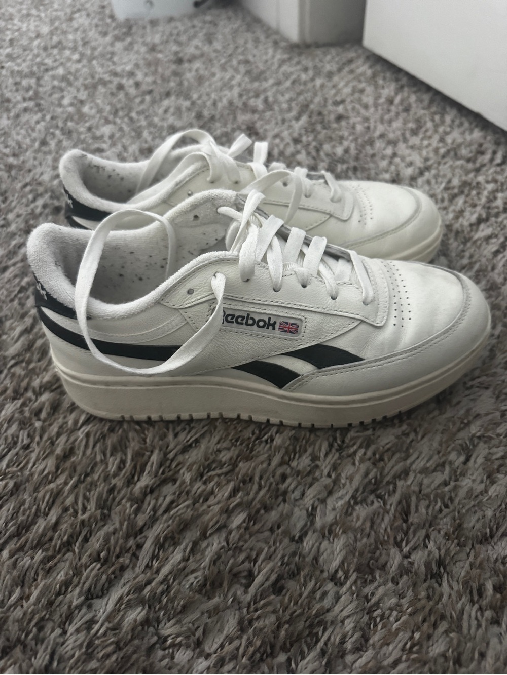 Reebok White Sneakers with Black Stripes